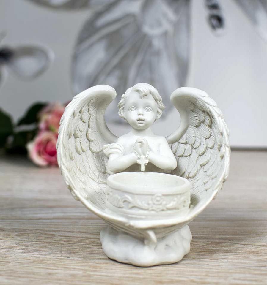 Trois photophores anges avec leurs grandes ailes e