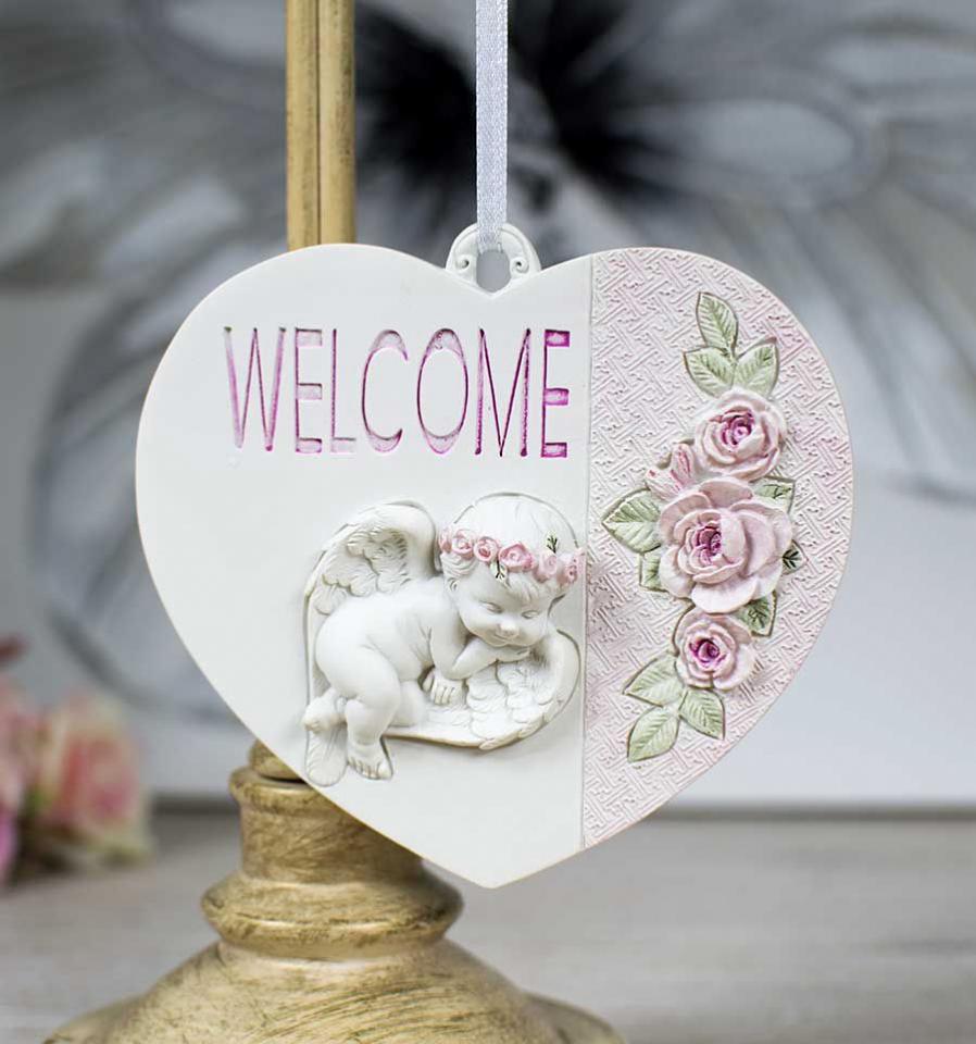 Coeur Welcome à accrocher avec sa décoration de fl