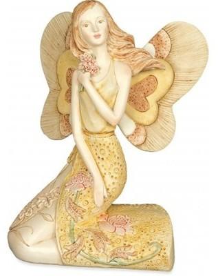 Ange agenouillé et coloré . Figurine en résine de
