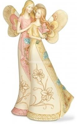 Ange avec son bouquet , mesurant 25.5 cm. Figurine