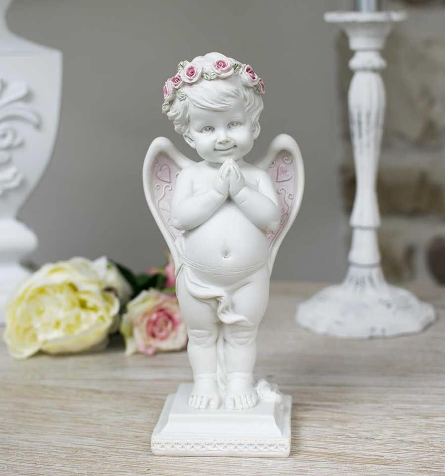 Chérubin priant et couronné de roses , un bel ange