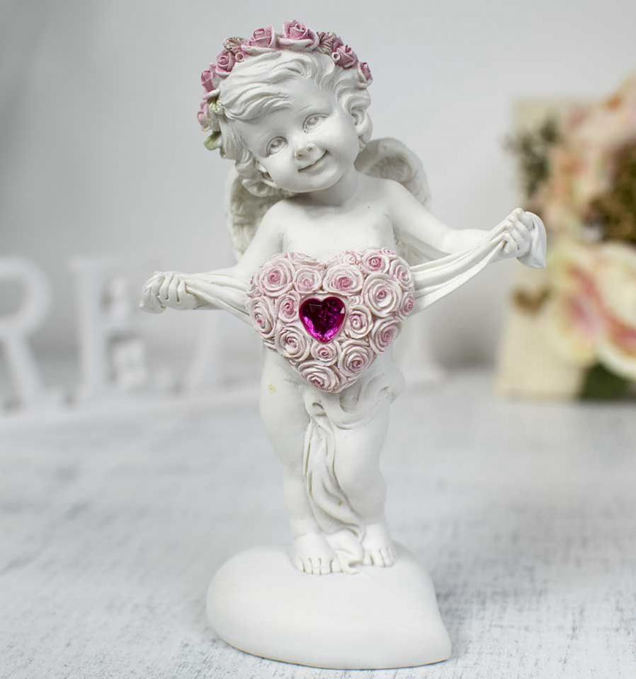 Statuette dange portant un coeur décoré de rubis