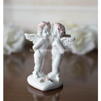Deux petits anges qui sembrassent.Un tableau char