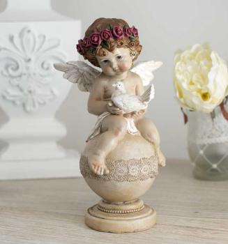 Ange baroque peint à la main , assis sur une boule