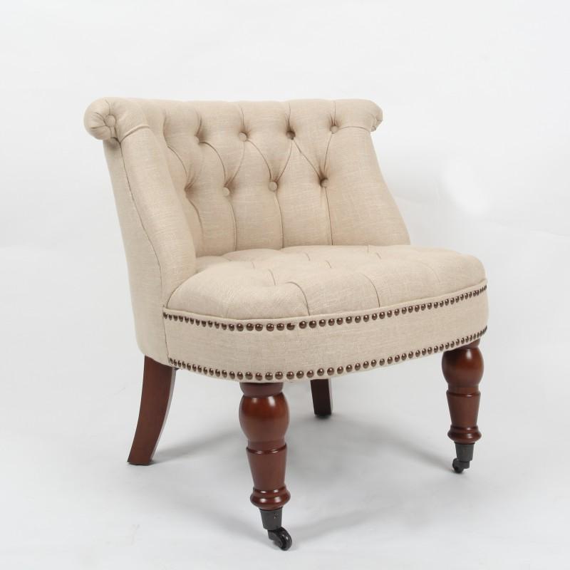 Fauteuil crapaud capitonné et clouté beige ? Westf