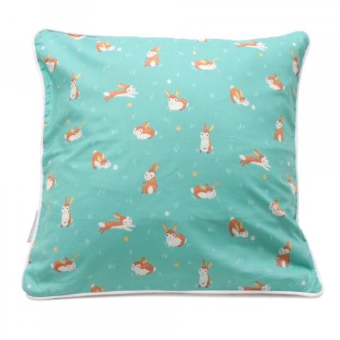 Housse de coussin turquoise et petits lapins