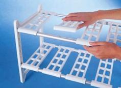 Étagère réglable pour dessous dévier et lavabo