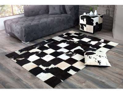 Tapis design en peau de vache patchwork noir blanc Tapis design en peau de vache