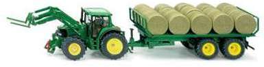Tracteur John Deere avec remorque à balles rondes